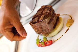 Carnival Cruise Line, Garnishing Steak ©Craig Orsini.jpg